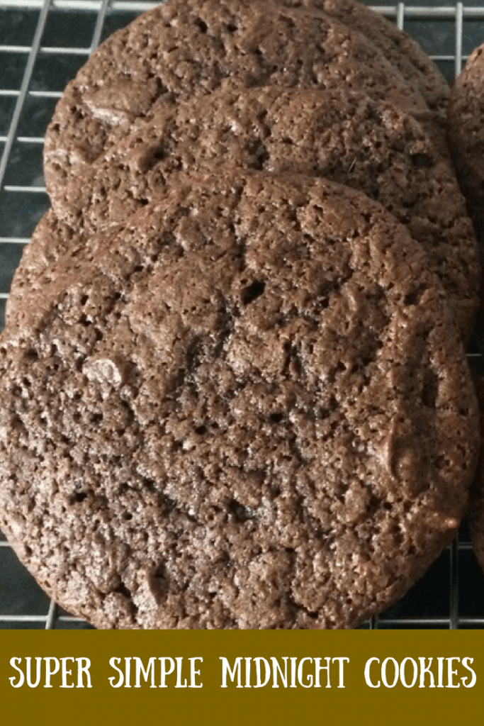 Midnight cookies on a cooling rack with text overlay that says super simple midnight cookies